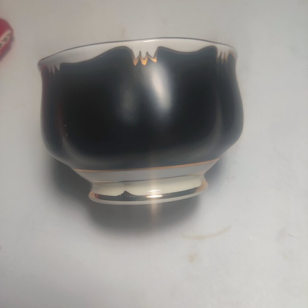 Royal Albert open bowl fine china, made in England. Used for nuts, candy, sugar.